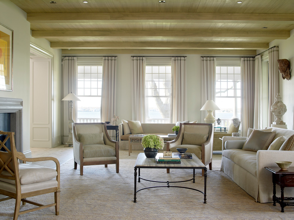 Inspiration for a traditional formal living room in New York with white walls.