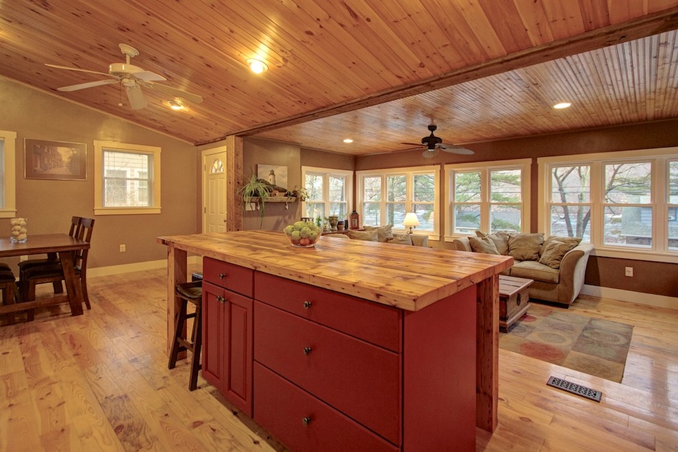 Photo of a small country l-shaped open plan kitchen in Boston with raised-panel cabinets, red cabinets, wood benchtops and with island.
