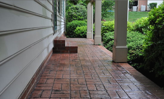 Design ideas for a small traditional front yard verandah in Other with concrete pavers and a roof extension.