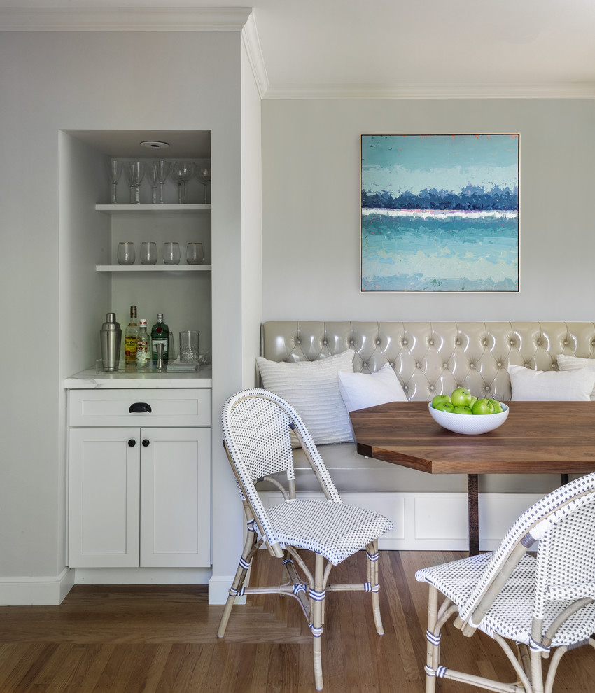 Mid-sized beach style dining room in San Francisco with grey walls, dark hardwood floors and no fireplace.