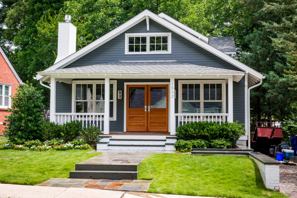 Craftsman blue two-story wood gable roof idea in Raleigh with a shingle roof