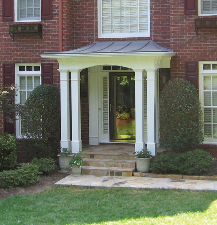 Mid-sized traditional front door in Atlanta with a single front door and a black front door.