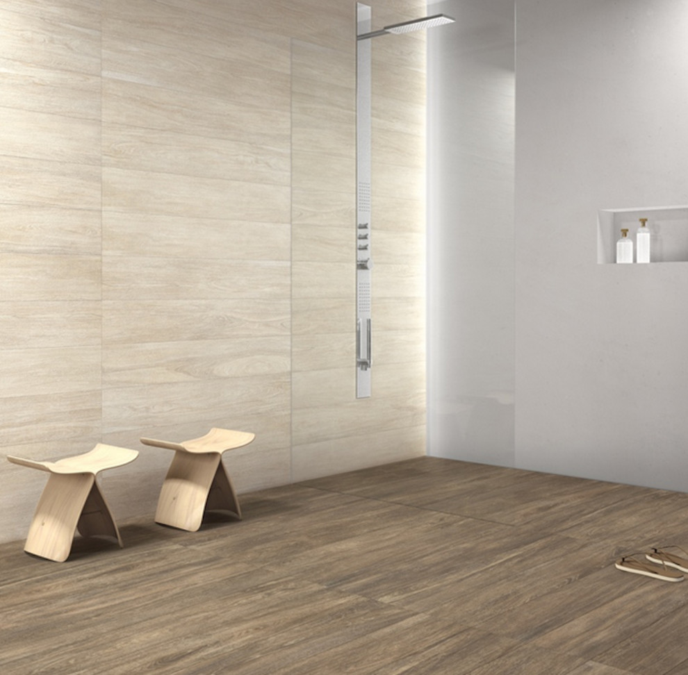 Inspiration for a modern bathroom in New York with beige tile, brown tile, stone tile and slate floors.