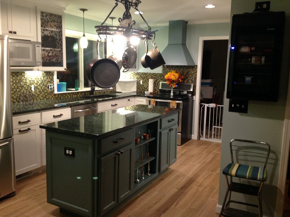Example of a transitional home design design in Raleigh