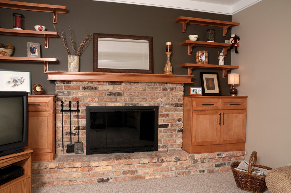 Inspiration for a small traditional loft-style family room in Minneapolis with beige walls, carpet, a brick fireplace surround and a corner tv.