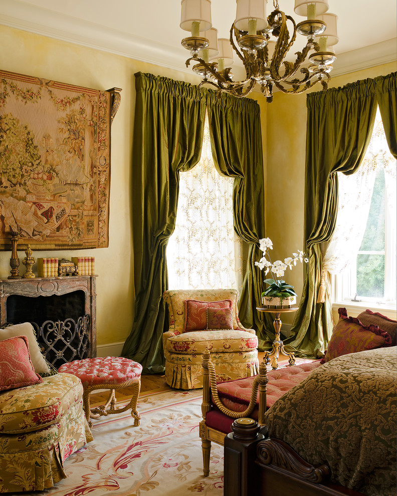 Inspiration for a traditional master bedroom in Richmond with a standard fireplace.