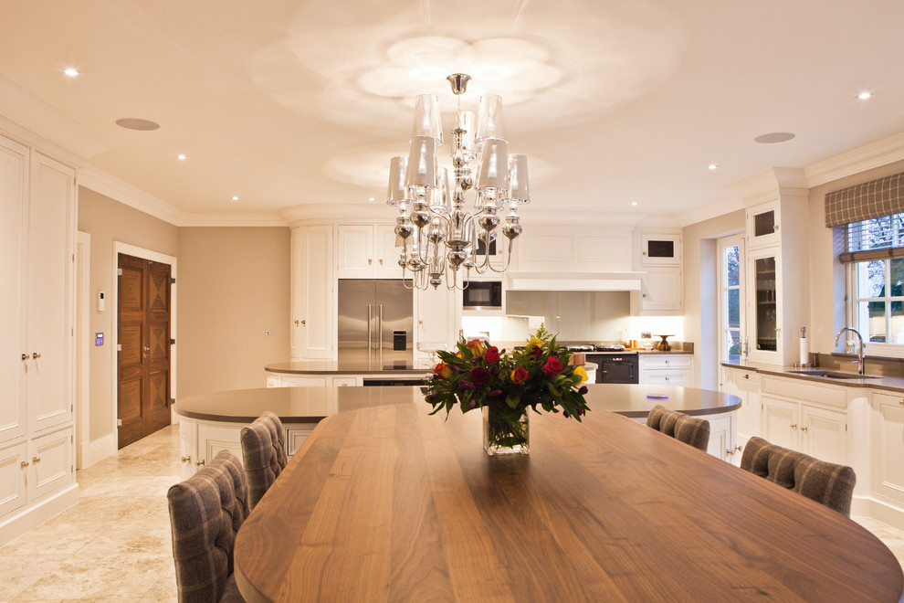 This is an example of an expansive contemporary open plan dining in Other with limestone floors.