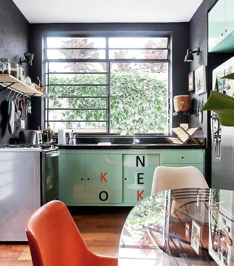 Photo of a small contemporary open plan kitchen in Madrid with shaker cabinets, green cabinets, engineered stone countertops, stainless steel appliances, medium hardwood flooring, brown floors and black worktops.