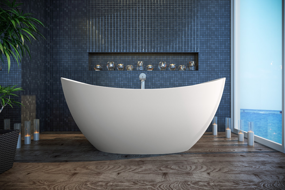 This is an example of a large scandinavian bathroom with a freestanding tub and light hardwood floors.