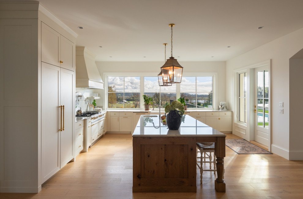 Example of a transitional kitchen design in Vancouver