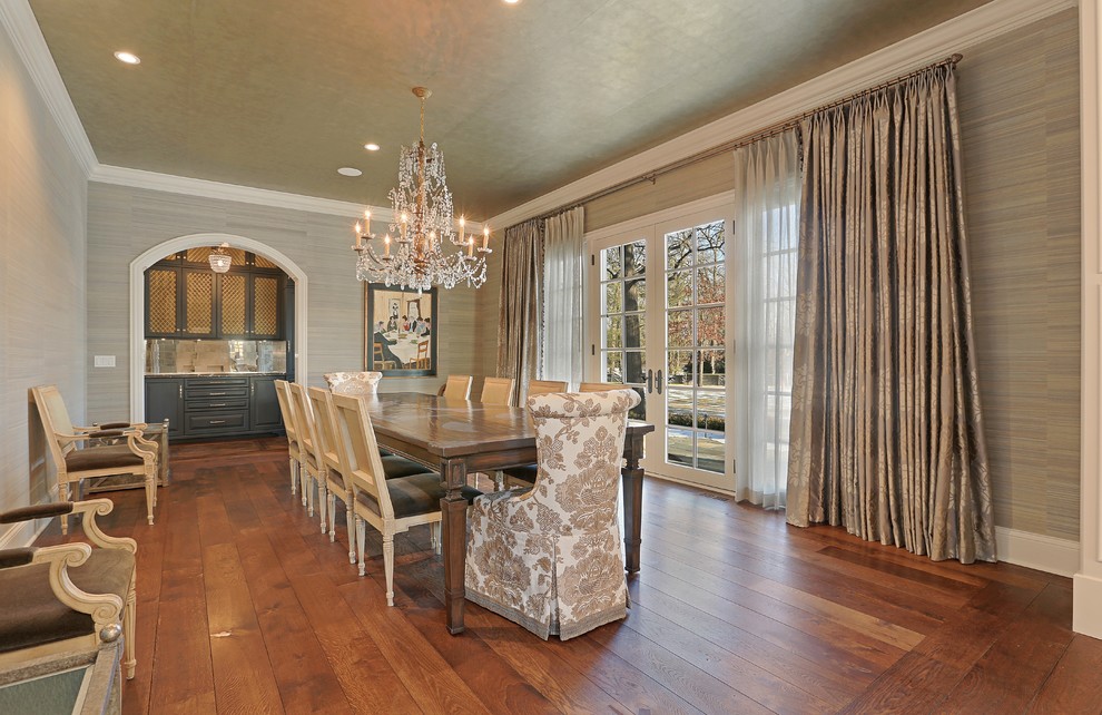 Inspiration for a large traditional separate dining room in Chicago with grey walls and medium hardwood floors.