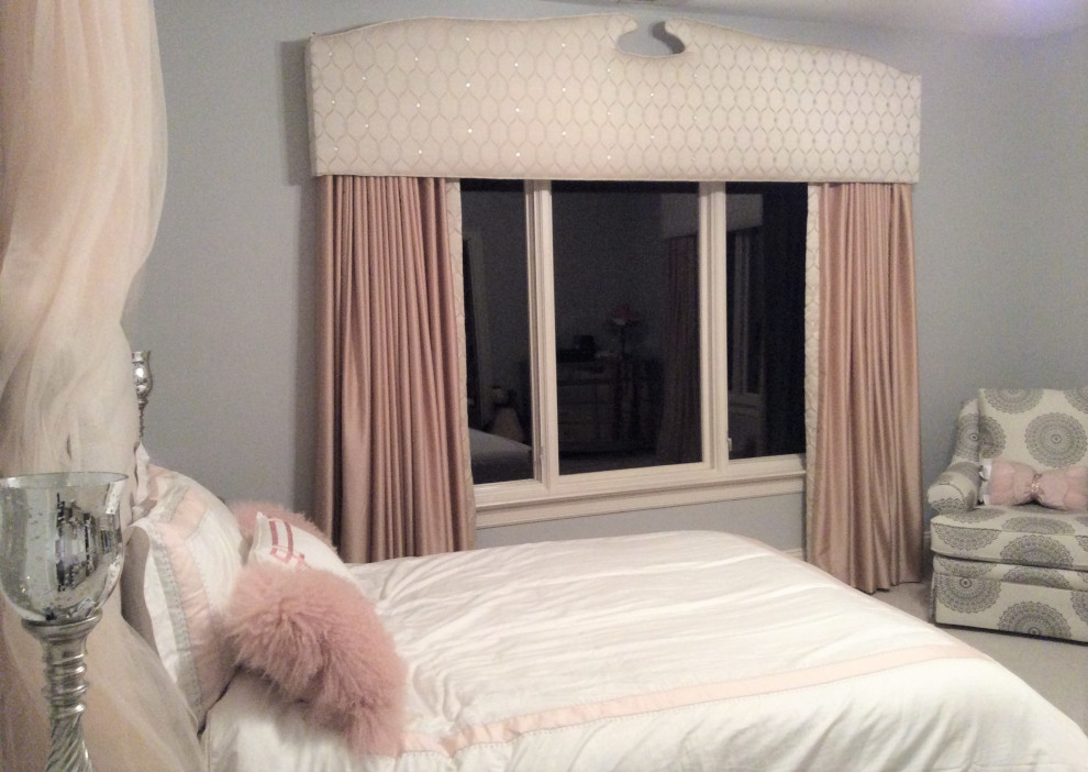 This is an example of a victorian children’s room for girls in Charlotte with grey walls, carpet and grey floors.