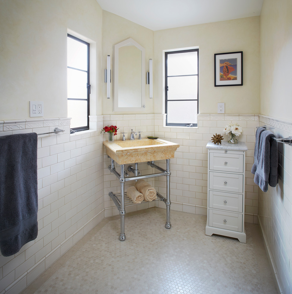 Inspiration for a small traditional bathroom in San Francisco with beige tile, marble benchtops, beige floor, yellow benchtops, subway tile, beige walls, mosaic tile floors and a console sink.