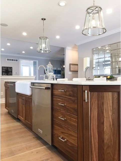 Open concept kitchen - large transitional single-wall ceramic tile open concept kitchen idea in Philadelphia with shaker cabinets, white cabinets, marble countertops, gray backsplash, subway tile backsplash, stainless steel appliances and an island