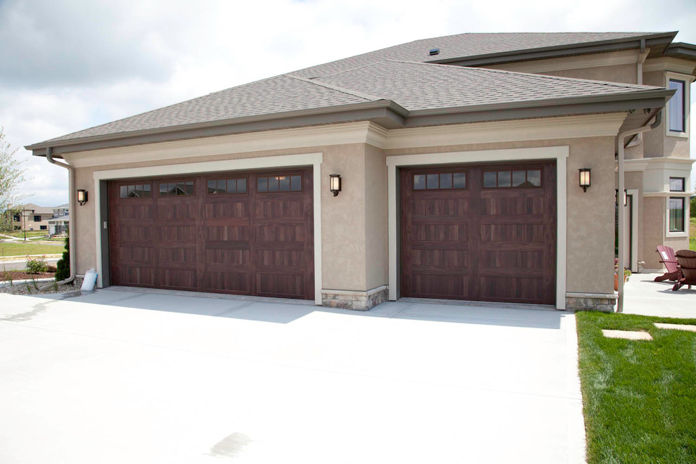 Example of a transitional garage design in Other
