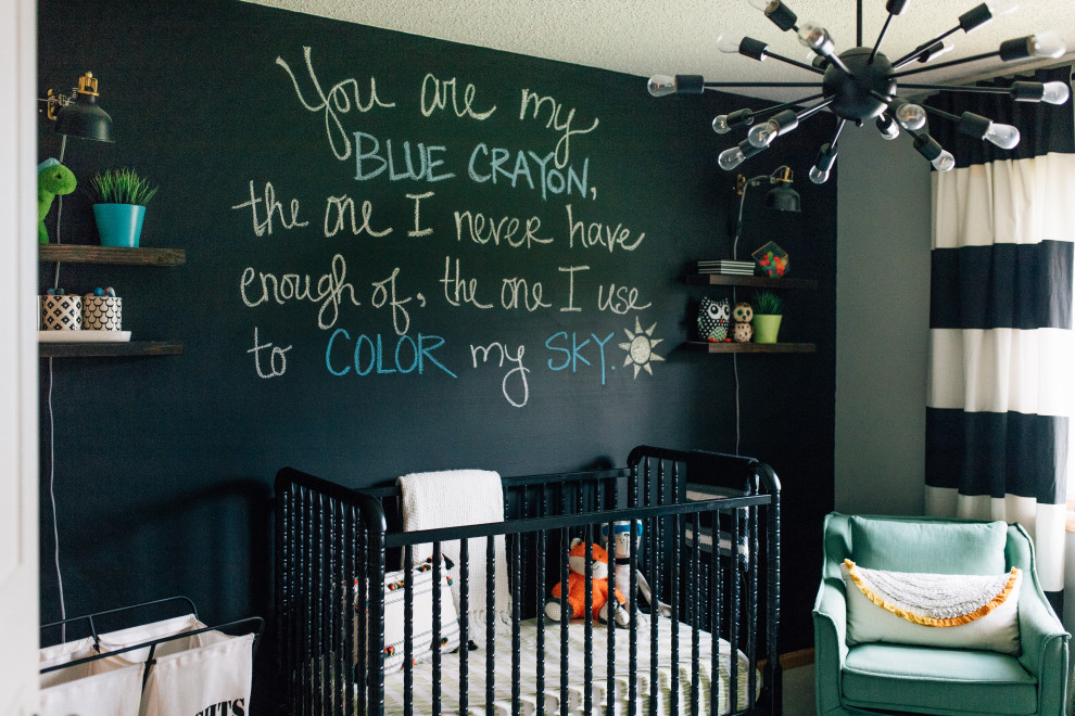 Mid-sized modern nursery in Minneapolis with black walls, carpet and beige floor for boys.