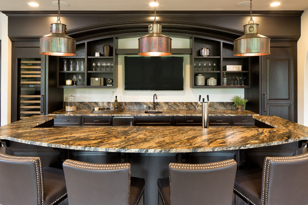 Photo of a traditional seated home bar in Minneapolis with an undermount sink, open cabinets and dark wood cabinets.