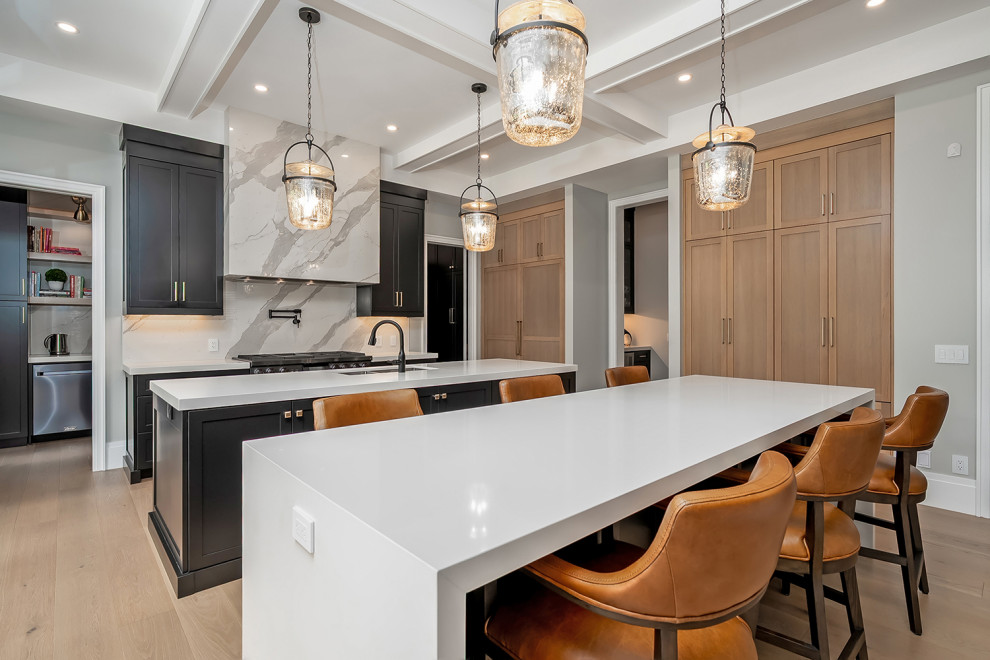Example of a transitional kitchen design in Toronto