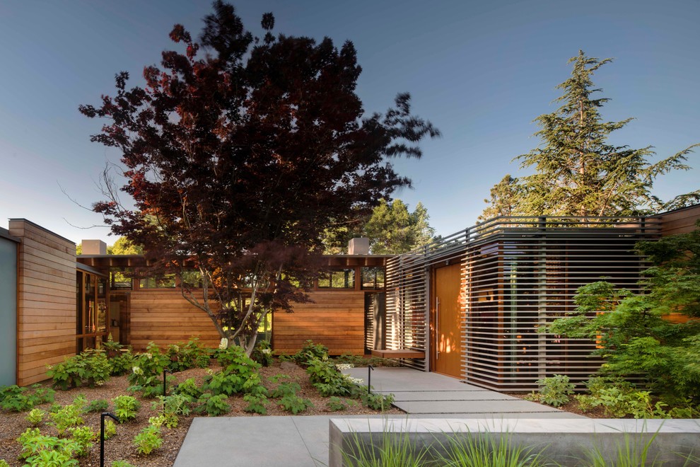 Inspiration for a modern house exterior in San Francisco with mixed siding.
