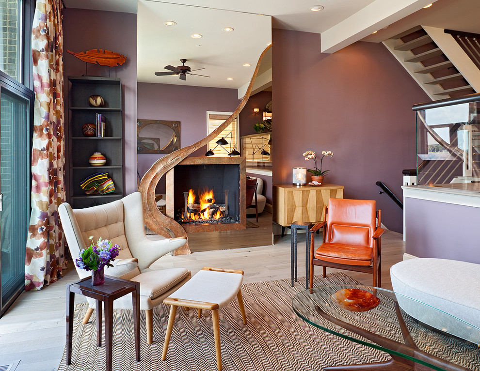 Design ideas for a mid-sized contemporary living room in Philadelphia with purple walls, porcelain floors, a standard fireplace and a stone fireplace surround.