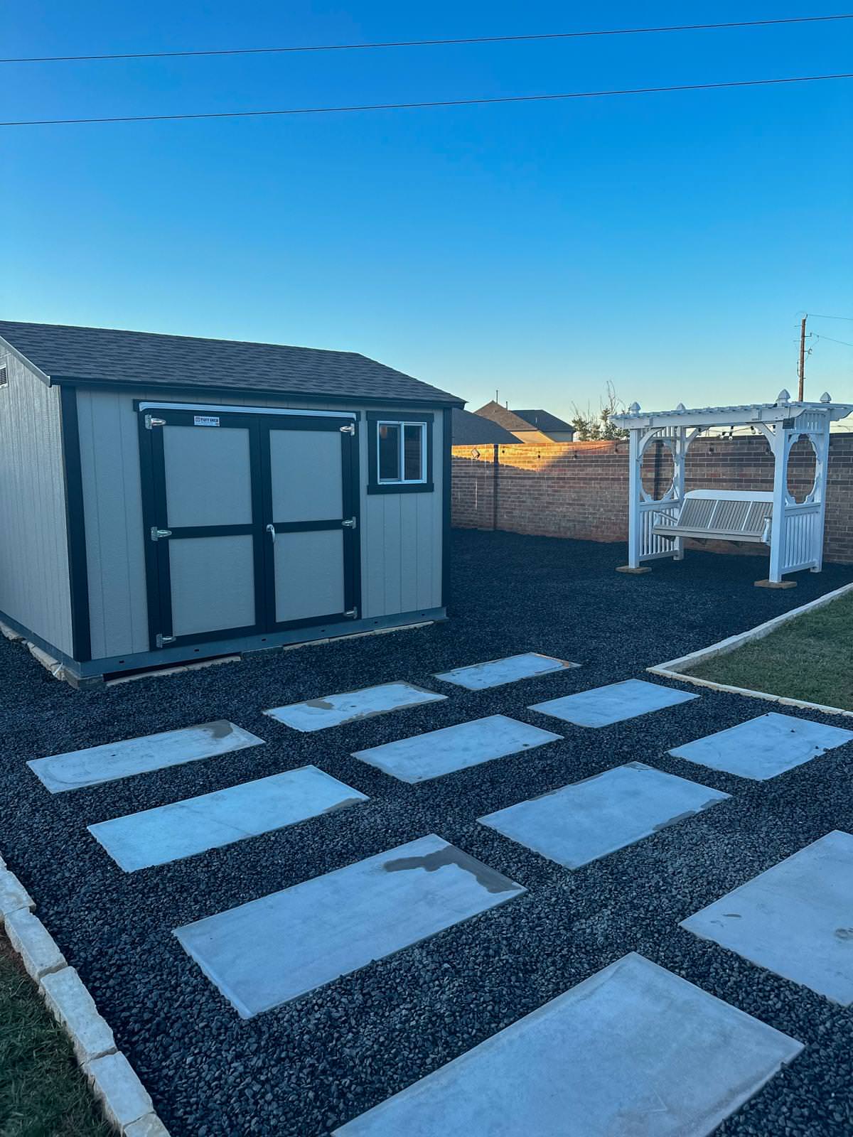 Backyard paver patio with gravel!