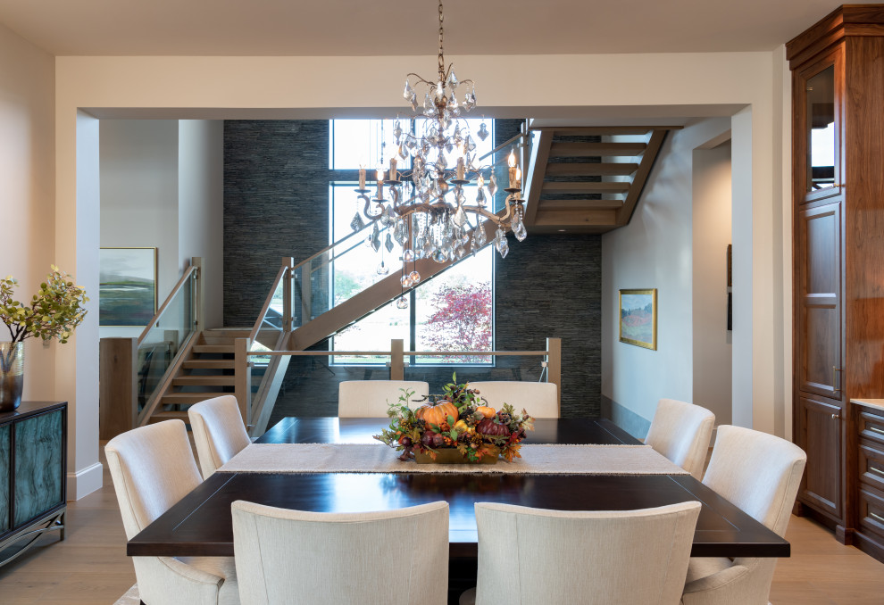 This is an example of a transitional dining room in Dallas.