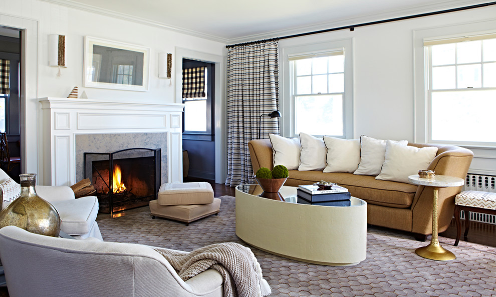 Photo of a transitional formal living room in New York with white walls, dark hardwood floors, a standard fireplace and a stone fireplace surround.
