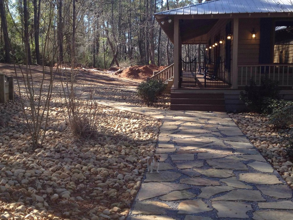 Photo of a shade side yard garden path.