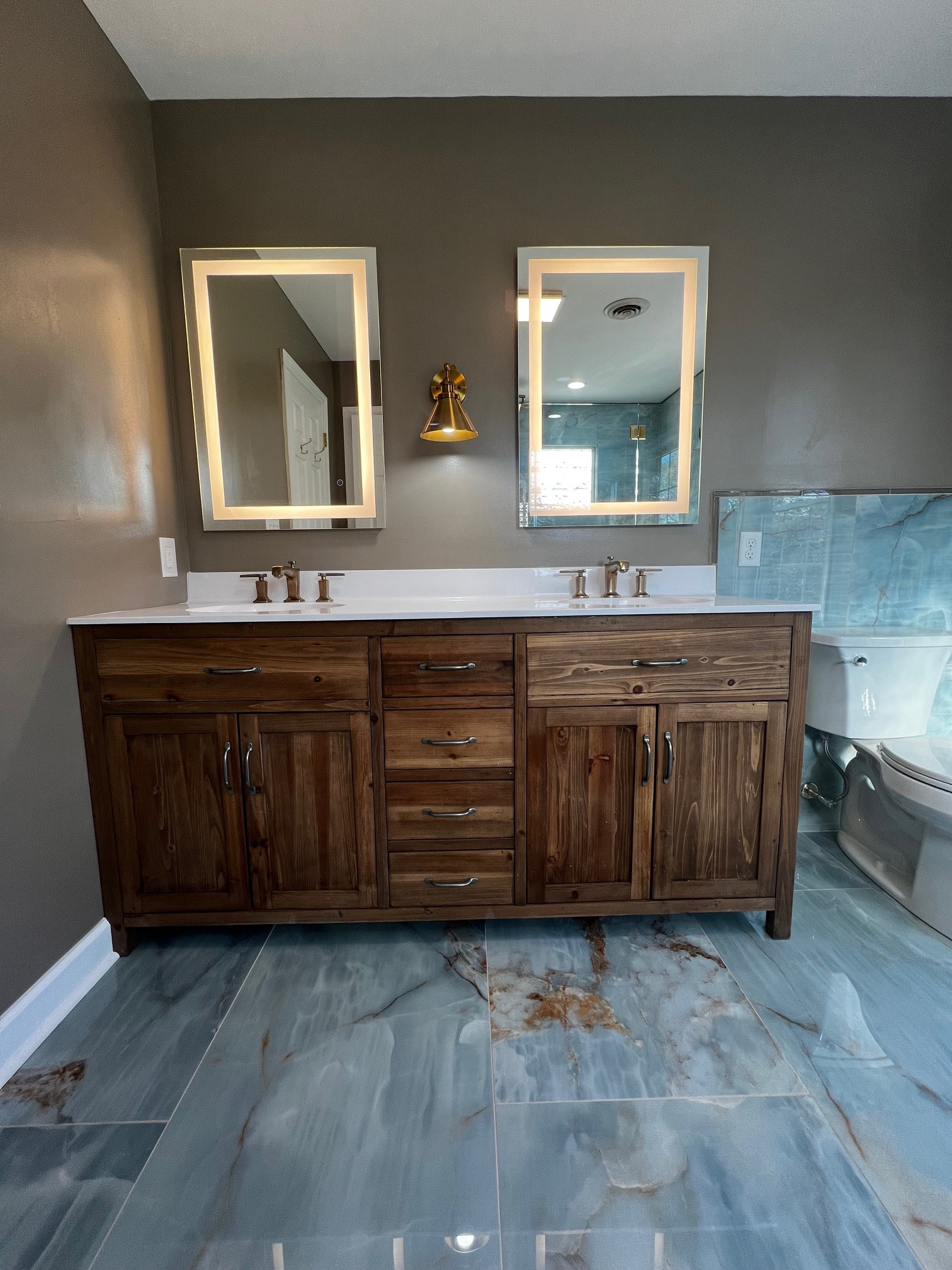 Winchester, VA bathroom remodel by Warren-Lee Construction featuring custom tile shower and modern finishes