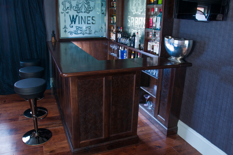 Design ideas for a small traditional single-wall home bar in Sussex with beaded inset cabinets, dark wood cabinets and wood benchtops.
