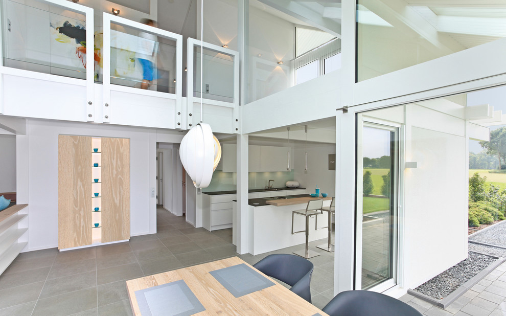Example of a mid-sized trendy dining room design in Stuttgart