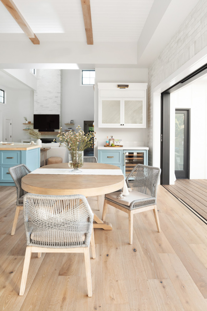 Large cottage l-shaped light wood floor, beige floor and shiplap ceiling open concept kitchen photo in Orange County with an undermount sink, shaker cabinets, blue cabinets, quartzite countertops, green backsplash, subway tile backsplash, stainless steel appliances, two islands and white countertops