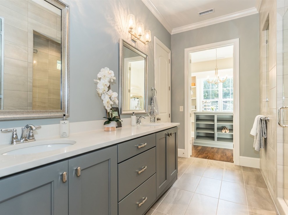 Inspiration for a mid-sized traditional 3/4 bathroom in Raleigh with shaker cabinets, grey cabinets, a double shower, blue tile, green walls, ceramic floors, an undermount sink, engineered quartz benchtops, brown floor and a hinged shower door.
