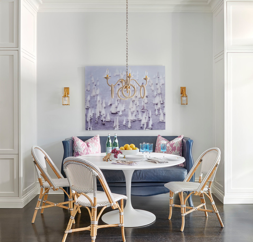 Transitional dining room in Chicago with white walls, dark hardwood floors and brown floor.