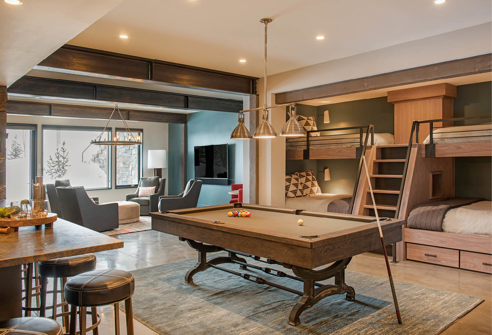 Inspiration for a large rustic gender-neutral concrete floor and gray floor teen room remodel in Other with beige walls