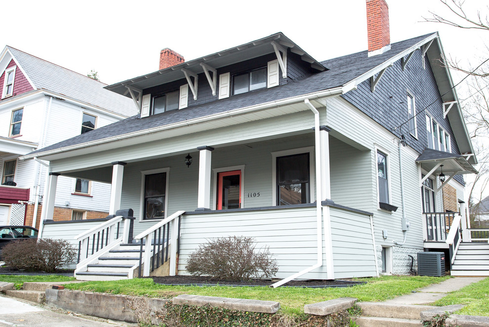 Inspiration for a mid-sized transitional gray two-story mixed siding house exterior remodel with a shingle roof