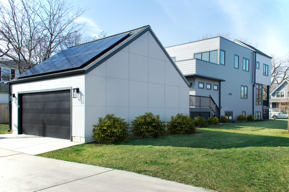 Example of a small minimalist detached two-car garage design in Chicago