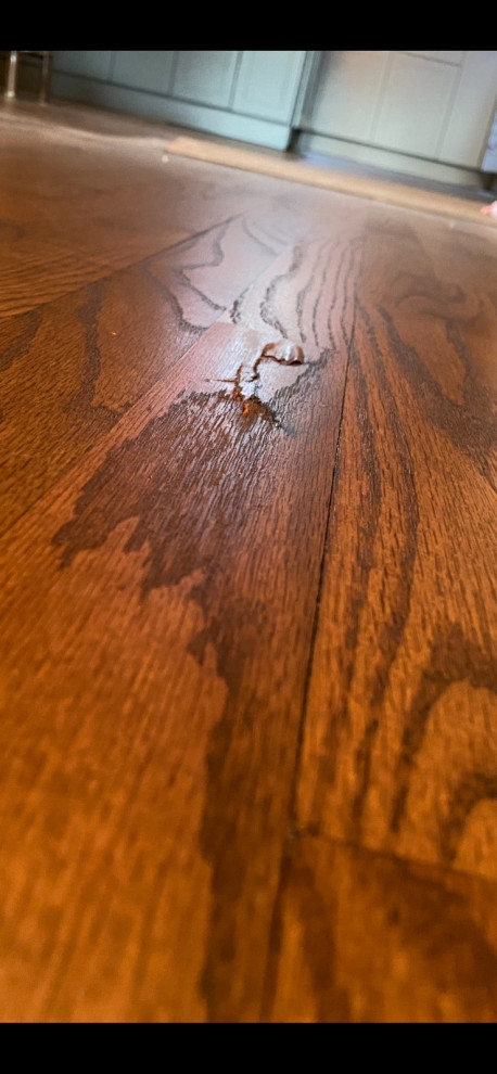 hardwood floor crack/splinter right after refinishing