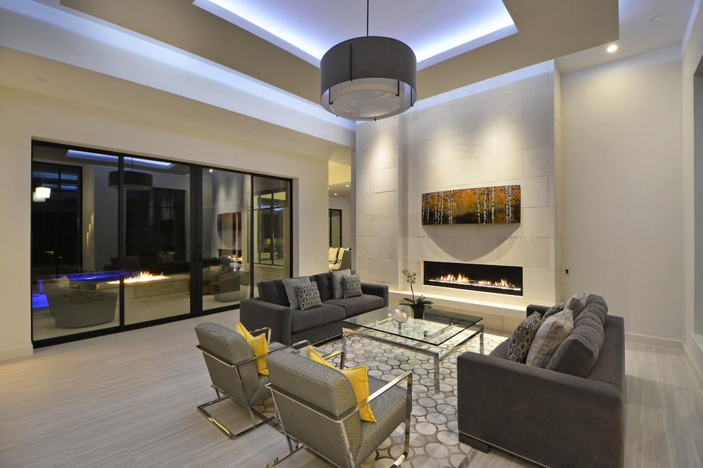 Photo of a contemporary formal open concept living room in Austin with white walls, a ribbon fireplace, a tile fireplace surround and no tv.