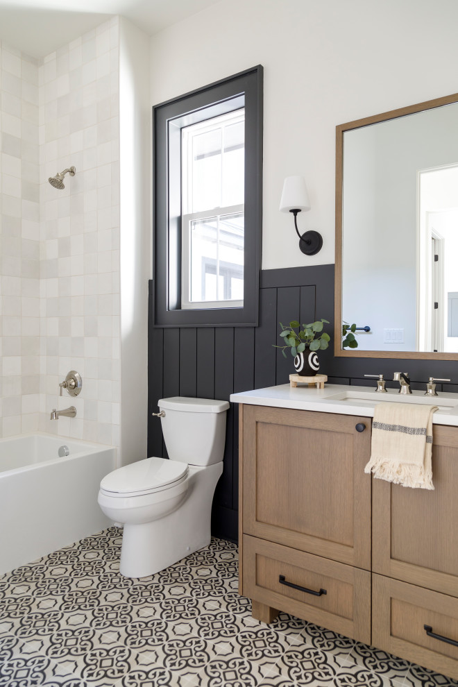 Example of a small farmhouse 3/4 porcelain tile cement tile floor, single-sink and shiplap wall bathroom design in Boise with shaker cabinets, medium tone wood cabinets, white walls, an undermount sink, quartz countertops, white countertops and a freestanding vanity