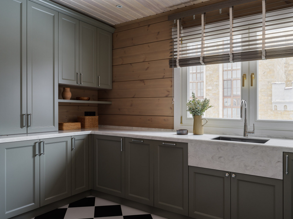 Mid-sized country u-shaped dedicated laundry room in Moscow with grey cabinets, solid surface benchtops, a stacked washer and dryer, grey benchtop, wood and wood walls.