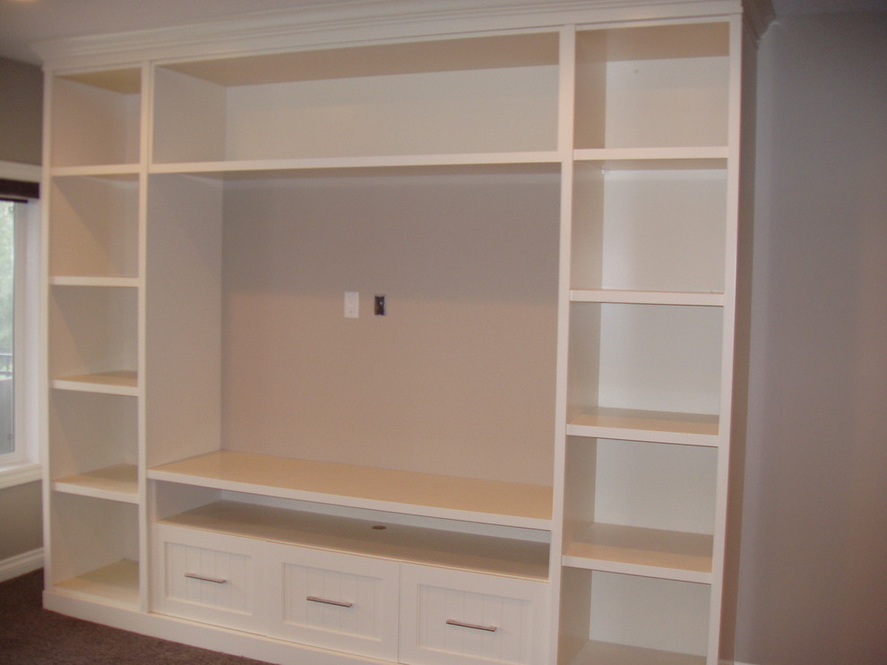 Example of a transitional living room design in Calgary