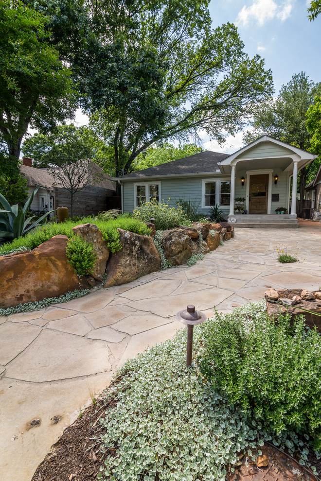 Inspiration for a modern front yard garden in Austin with a garden path.
