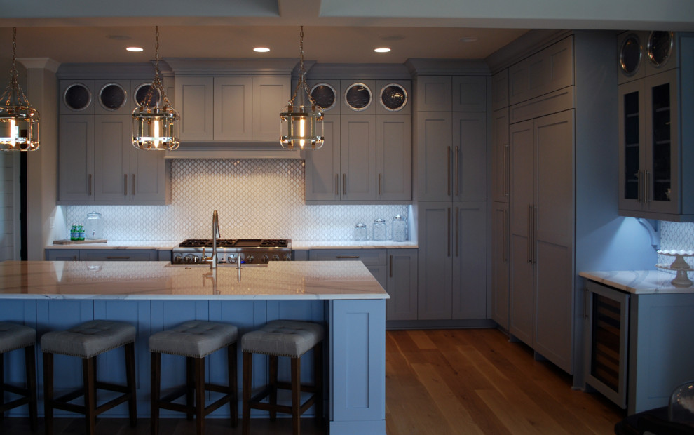 Beach style kitchen in Wilmington with shaker cabinets.
