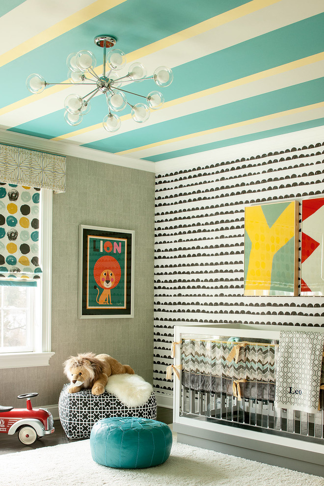 Mid-sized contemporary gender-neutral nursery in New York with multi-coloured walls and dark hardwood floors.