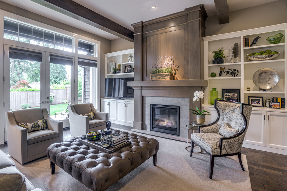 Inspiration for a mid-sized transitional formal open concept living room in Portland with grey walls, dark hardwood floors, a standard fireplace and a freestanding tv.