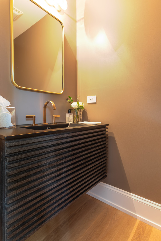 Modern Bathroom Sink with Gold Faucet and Wooden Cabinet