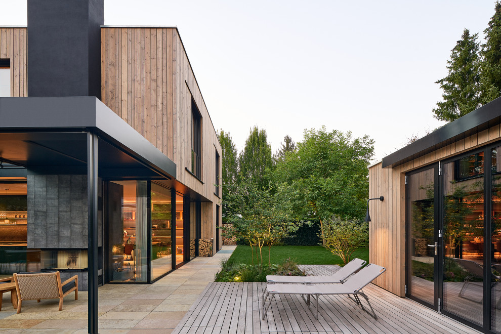 Immagine di una terrazza minimalista con con illuminazione