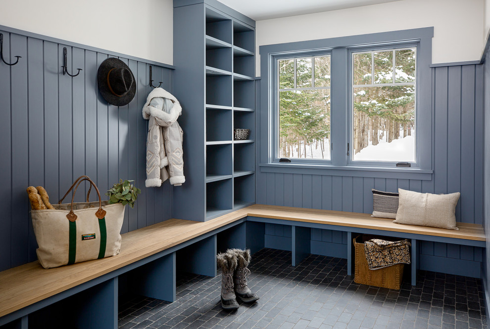Inspiration for a mid-sized transitional mudroom in Burlington with white walls, a single front door, a gray front door, grey floor and planked wall panelling.