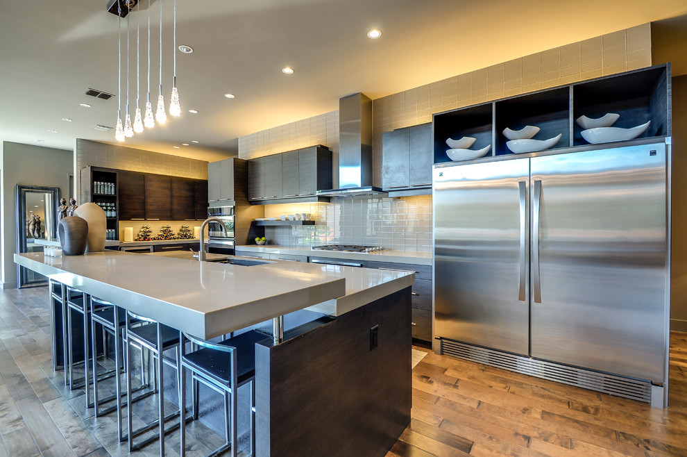 Inspiration for a large modern open plan kitchen in Dallas with medium hardwood floors.